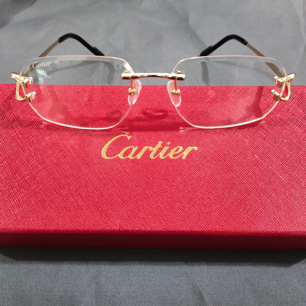 Cartier Rimless Gold Glasses with Black Temples
